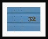 32 Number Sign on Beach hut close-up, Blue Background by Assaf Frank